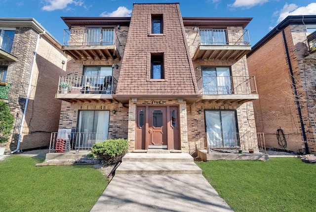 6612 W 64th Pl Unit 3W, Chicago, IL 60638 - view of front of house featuring a balcony and brick siding
