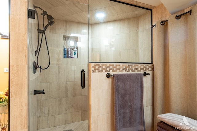 bathroom featuring a shower stall