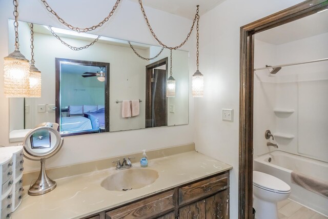 5N683 Ravine Dr, Saint Charles, IL 60175 - ensuite bathroom featuring vanity, toilet, and bathing tub / shower combination
