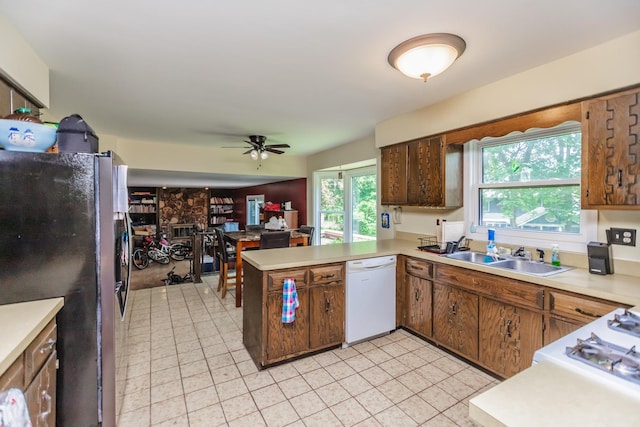 5N683 Ravine Dr, Saint Charles, IL 60175 - kitchen featuring freestanding refrigerator, dishwasher, a sink, ceiling fan, and light countertops