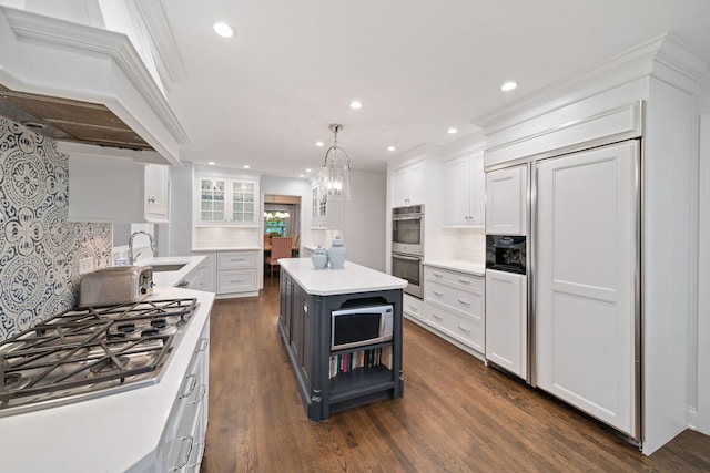 1305 Sleepy Hollow Rd, Glenview, IL 60025 - kitchen featuring stainless steel appliances, white cabinets, premium range hood, tasteful backsplash, and light countertops