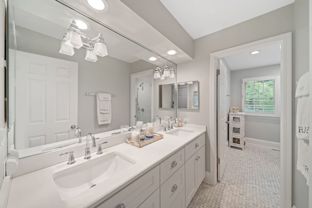 1305 Sleepy Hollow Rd, Glenview, IL 60025 - bathroom with double vanity, a shower with shower door, and recessed lighting