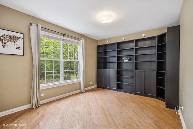 218 Bridle Path Ln, Fox River Grove, IL 60021 - empty room featuring wood finished floors and baseboards