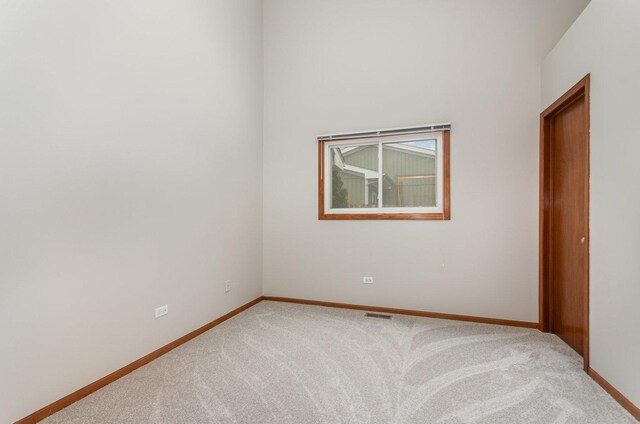 1936 Sybil Dr, Crest Hill, IL 60403 - unfurnished room featuring light carpet and baseboards