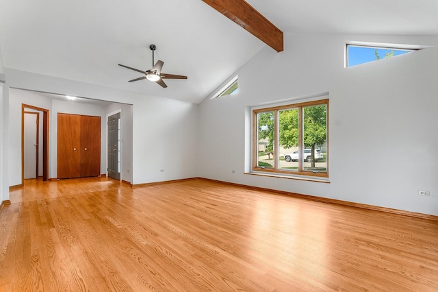 1936 Sybil Dr, Crest Hill, IL 60403 - unfurnished living room featuring beamed ceiling, ceiling fan, light wood-style flooring, high vaulted ceiling, and baseboards