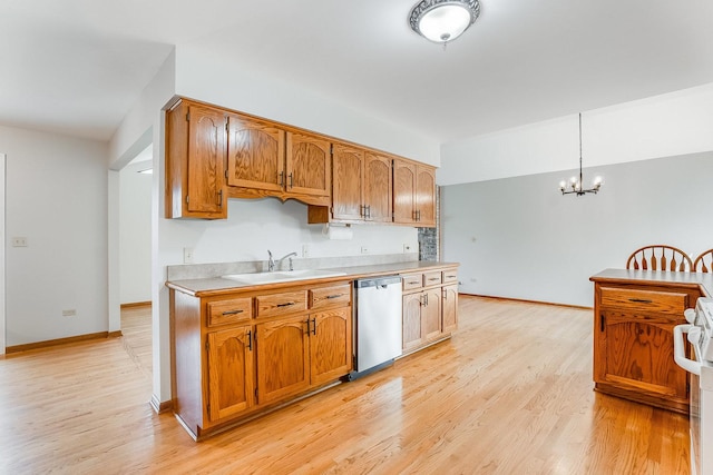 1936 Sybil Dr, Crest Hill, IL 60403 - kitchen featuring stainless steel dishwasher, a sink, light countertops, a chandelier, and baseboards