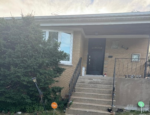 9320 S Clyde Ave, Chicago, IL 60617 - doorway to property with brick siding