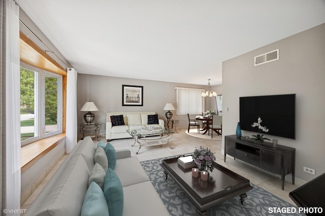 769 N Eastland St, Elmhurst, IL 60126 - living room with a chandelier