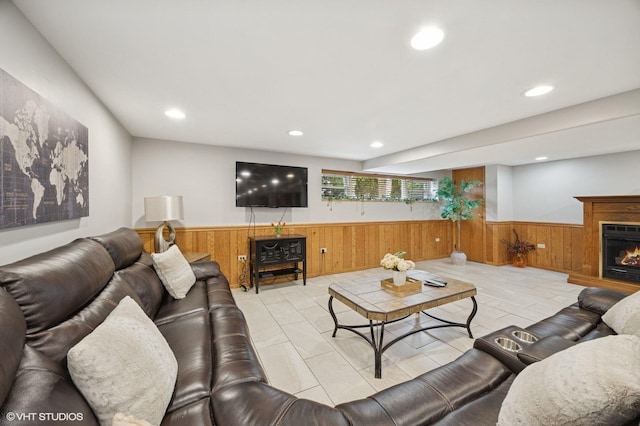 769 N Eastland St, Elmhurst, IL 60126 - living area with wainscoting, wooden walls, recessed lighting, and a warm lit fireplace