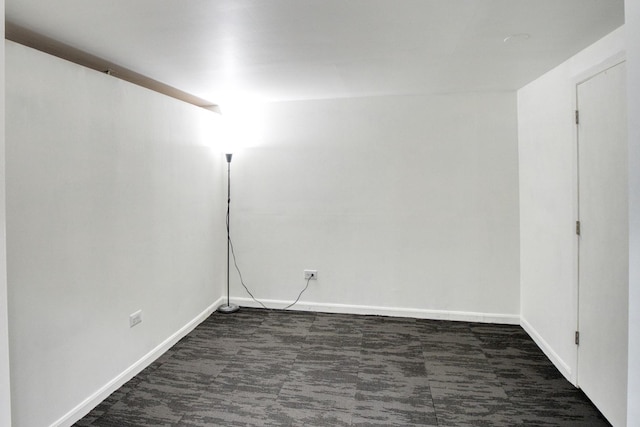 5416 N Neva Ave, Chicago, IL 60656 - spare room featuring dark carpet and baseboards
