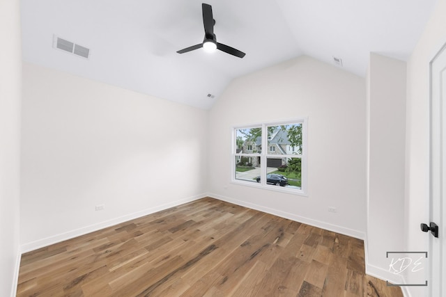 715 N Brainard St, Naperville, IL 60563 - empty room with a ceiling fan, lofted ceiling, and wood finished floors