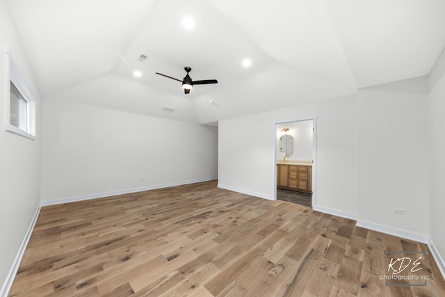 715 N Brainard St, Naperville, IL 60563 - unfurnished bedroom with lofted ceiling, light wood-style floors, recessed lighting, ensuite bath, and ceiling fan
