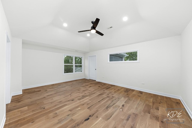 715 N Brainard St, Naperville, IL 60563 - empty room with wood finished floors, ceiling fan, recessed lighting, and lofted ceiling