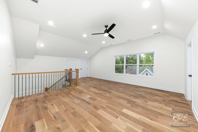 715 N Brainard St, Naperville, IL 60563 - additional living space featuring vaulted ceiling, ceiling fan, light wood-style floors, and recessed lighting