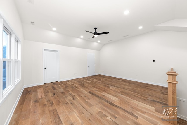 715 N Brainard St, Naperville, IL 60563 - additional living space with vaulted ceiling, light wood finished floors, recessed lighting, and a ceiling fan