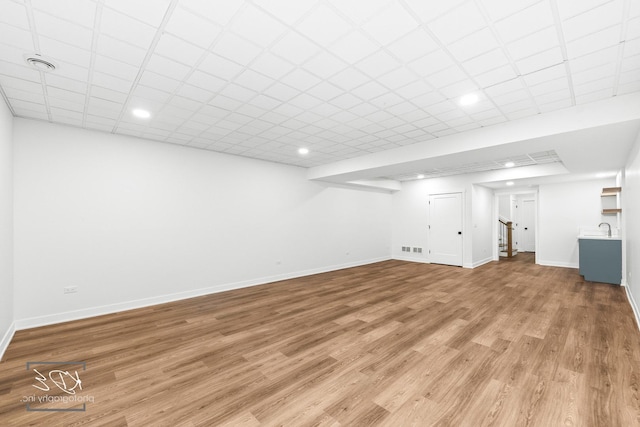 715 N Brainard St, Naperville, IL 60563 - finished basement featuring light wood-style floors, recessed lighting, and stairs