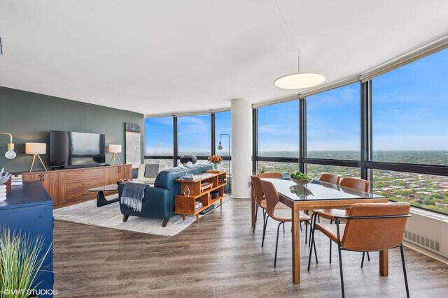 5415 N Sheridan Rd Unit 5011, Chicago, IL 60640 - dining space with a wall of windows and wood finished floors