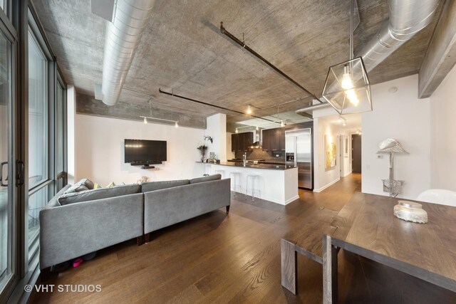 240 E Illinois St Unit 402, Chicago, IL 60611 - living area with dark wood-type flooring