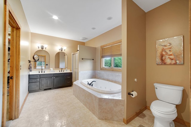 4916 Country Springs Dr, Johnsburg, IL 60051 - bathroom with a jetted tub, double vanity, tile patterned floors, baseboards, and toilet