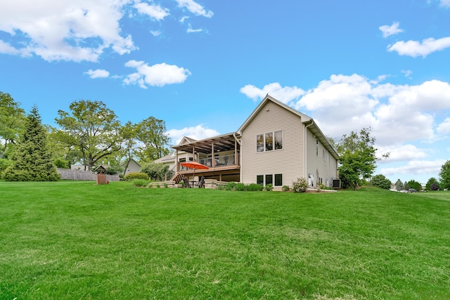4916 Country Springs Dr, Johnsburg, IL 60051 - rear view of property with a wooden deck, a lawn, central AC unit, and stairs