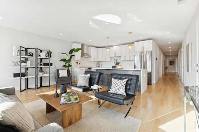 2212 W Lawrence Ave Unit 2W, Chicago, IL 60625 - living room with recessed lighting, light wood finished floors, and baseboards