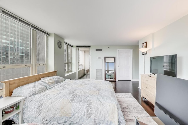 345 N Lasalle Blvd Unit 3602, Chicago, IL 60654 - bedroom featuring dark wood-style floors and baseboards