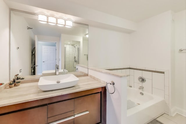 345 N Lasalle Blvd Unit 3602, Chicago, IL 60654 - bathroom with a bath, vanity, a stall shower, and tile patterned floors