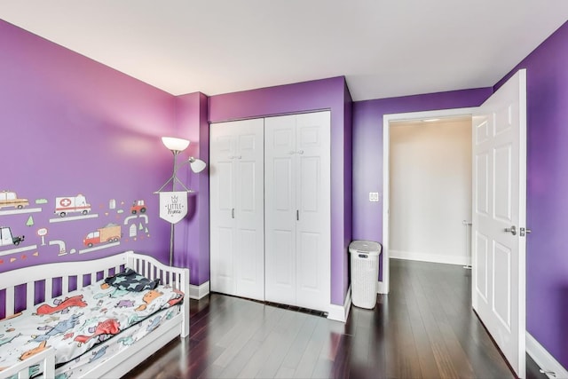 345 N Lasalle Blvd Unit 3602, Chicago, IL 60654 - bedroom featuring wood finished floors, baseboards, and a closet