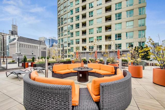 345 N Lasalle Blvd Unit 3602, Chicago, IL 60654 - view of patio featuring an outdoor living space with a fire pit and a city view