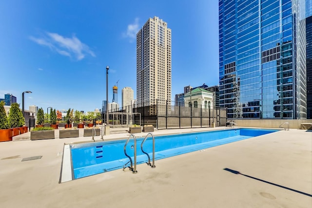 345 N Lasalle Blvd Unit 3602, Chicago, IL 60654 - community pool featuring a view of city and a patio area