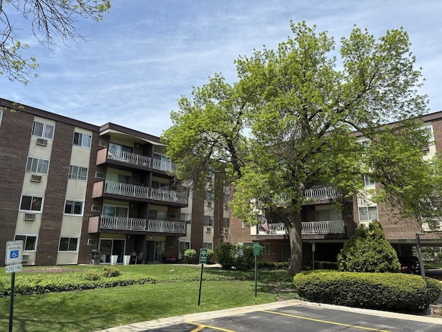 1331 S Finley Rd Unit 114, Lombard, IL 60148 - view of apartment building / complex with uncovered parking
