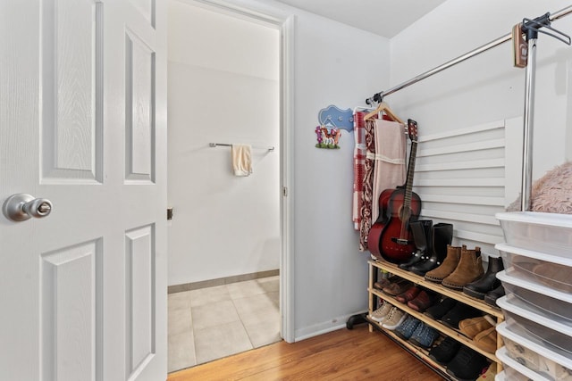 1331 S Finley Rd Unit 114, Lombard, IL 60148 - bathroom with baseboards and wood finished floors