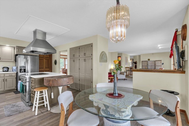 4008 Pinecrest Dr, Champaign, IL 61822 - dining room with light wood-style floors and a chandelier