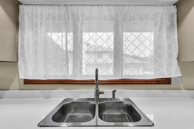 4008 Pinecrest Dr, Champaign, IL 61822 - kitchen view of a sink and light countertops