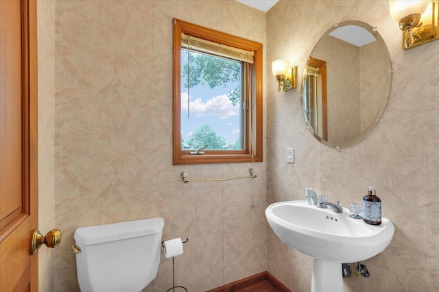 4008 Pinecrest Dr, Champaign, IL 61822 - half bathroom with toilet and a sink