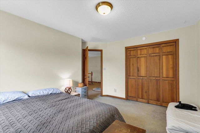 4008 Pinecrest Dr, Champaign, IL 61822 - bedroom with light carpet, baseboards, and a closet