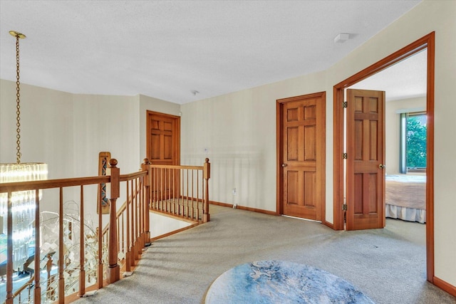 4008 Pinecrest Dr, Champaign, IL 61822 - hall featuring an upstairs landing and carpet