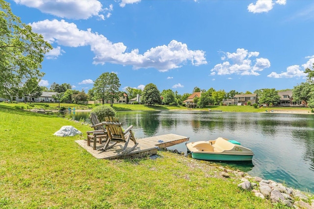4008 Pinecrest Dr, Champaign, IL 61822 - dock area featuring a water view, a lawn, and a residential view