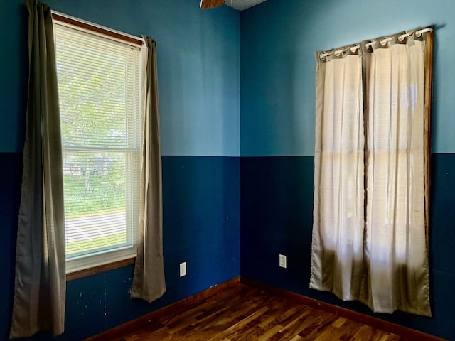109 S Willow St, Toluca, IL 61369 - empty room with wood finished floors