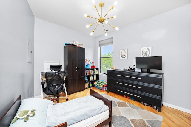 1637 W Columbia Ave Unit 3W, Chicago, IL 60626 - bedroom with a chandelier, light wood-style flooring, baseboards, and electric panel