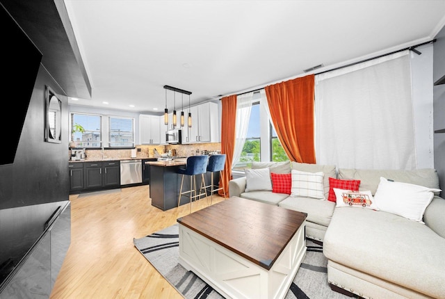 1637 W Columbia Ave Unit 3W, Chicago, IL 60626 - living room with light wood-type flooring and recessed lighting