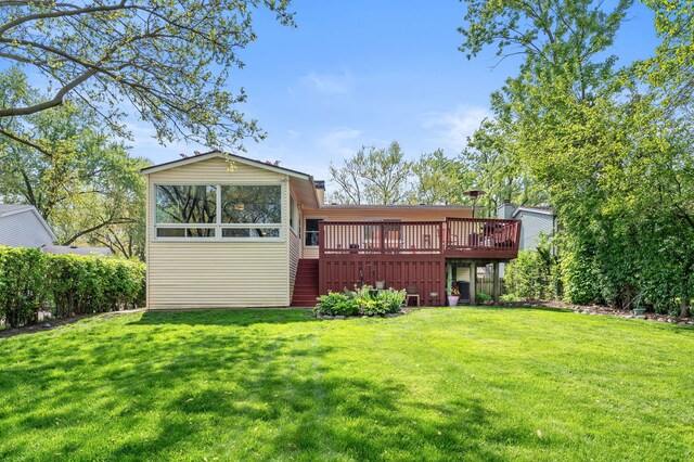 627 Raupp Blvd, Buffalo Grove, IL 60089 - rear view of property featuring a wooden deck and a yard