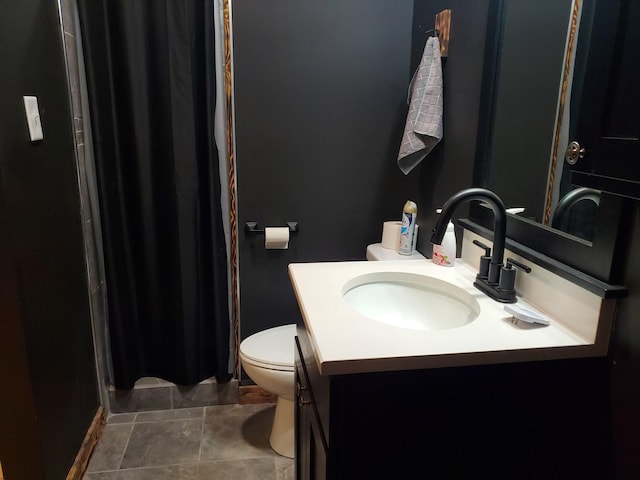 507 N Secor St, Gilman, IL 60938 - bathroom with toilet, vanity, and a stall shower