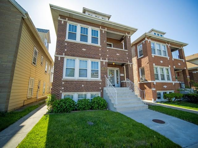 4912 S Komensky Ave, Chicago, IL 60632 - view of front of property with brick siding and a front lawn