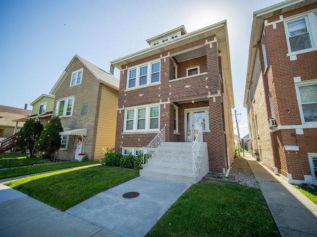 4912 S Komensky Ave, Chicago, IL 60632 - view of front of property with brick siding and a front yard
