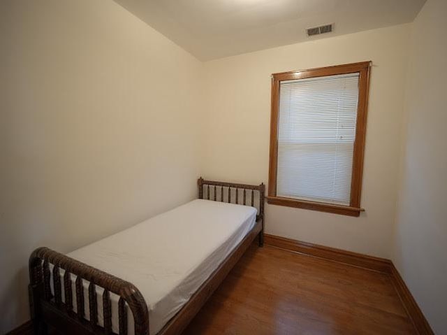 4912 S Komensky Ave, Chicago, IL 60632 - bedroom featuring wood finished floors and baseboards