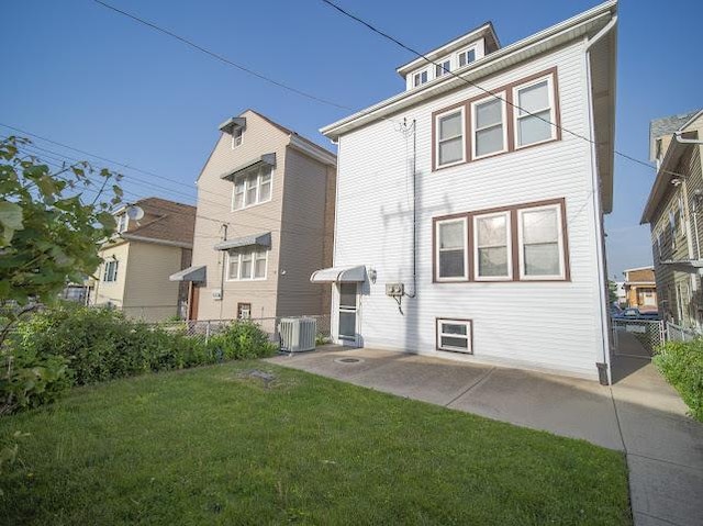 4912 S Komensky Ave, Chicago, IL 60632 - back of house with a patio area and central AC unit