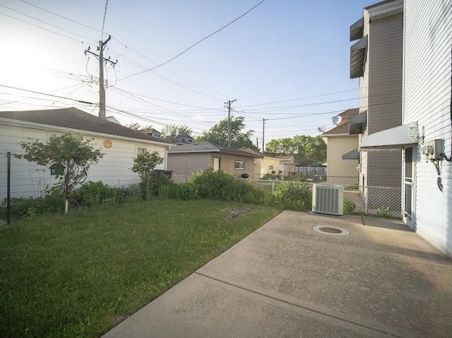 4912 S Komensky Ave, Chicago, IL 60632 - view of yard with central AC unit and a patio