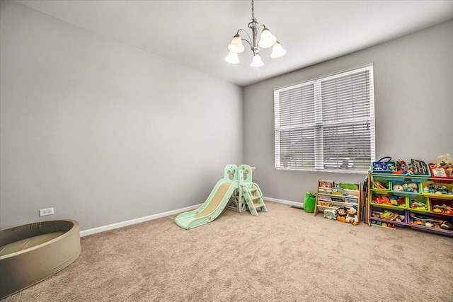 14117 Meadow Ln, Plainfield, IL 60544 - recreation room with a chandelier, carpet flooring, and baseboards