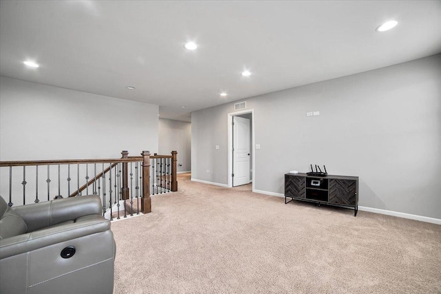 14117 Meadow Ln, Plainfield, IL 60544 - living area featuring light colored carpet, an upstairs landing, baseboards, and recessed lighting